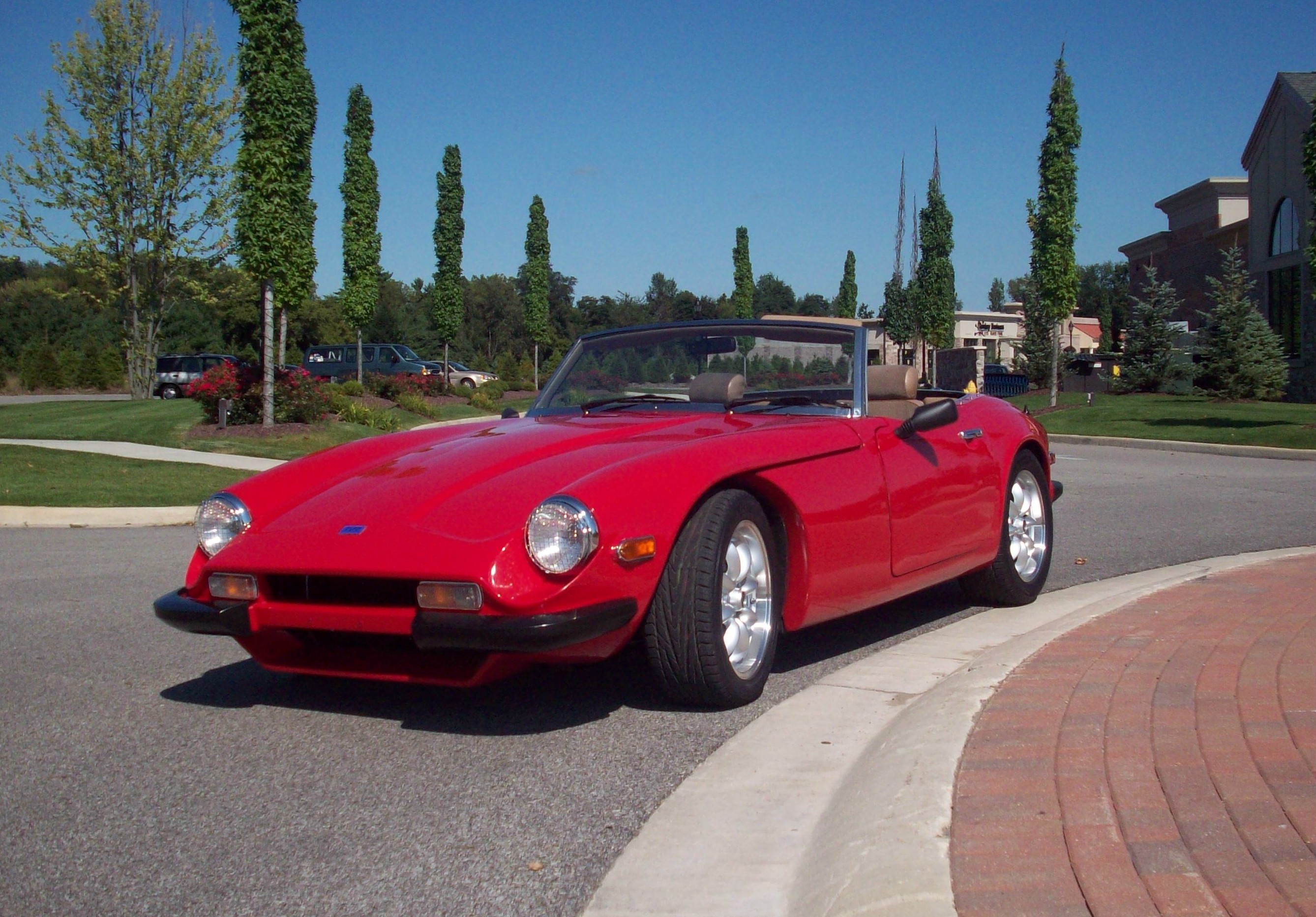 Left Front Corner View of a red TVR 3000s